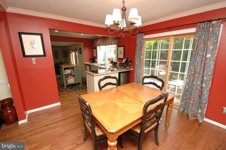 4331 Cub Run Road Chantilly, VA 20151 - Photo 27 of 30 a view of a dining room with furniture window and wooden floor