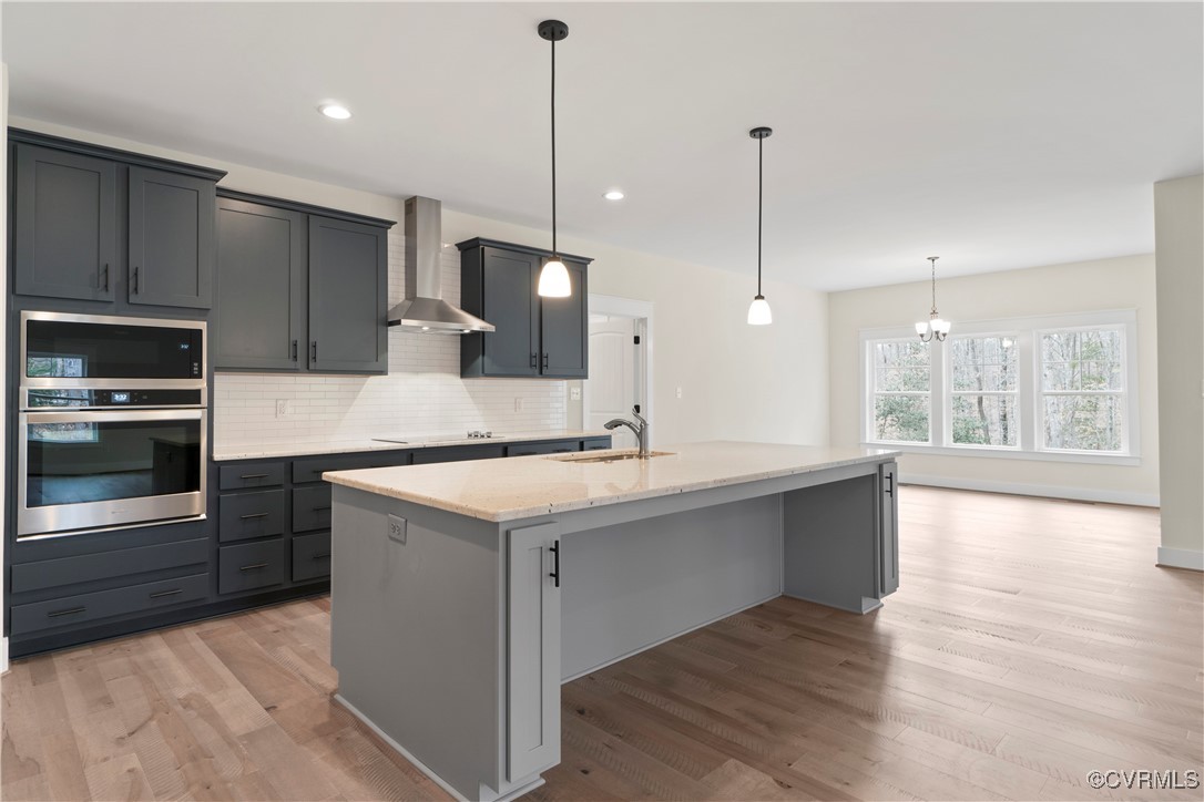 Tbd #3 Rocky Ford Road Beaverdam, VA 23015 - Photo 19 of 43 Kitchen with light stone countertops, wall chimney