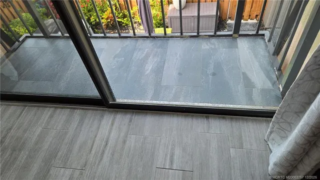 a spacious bathroom with a double vanity sink mirror and toilet