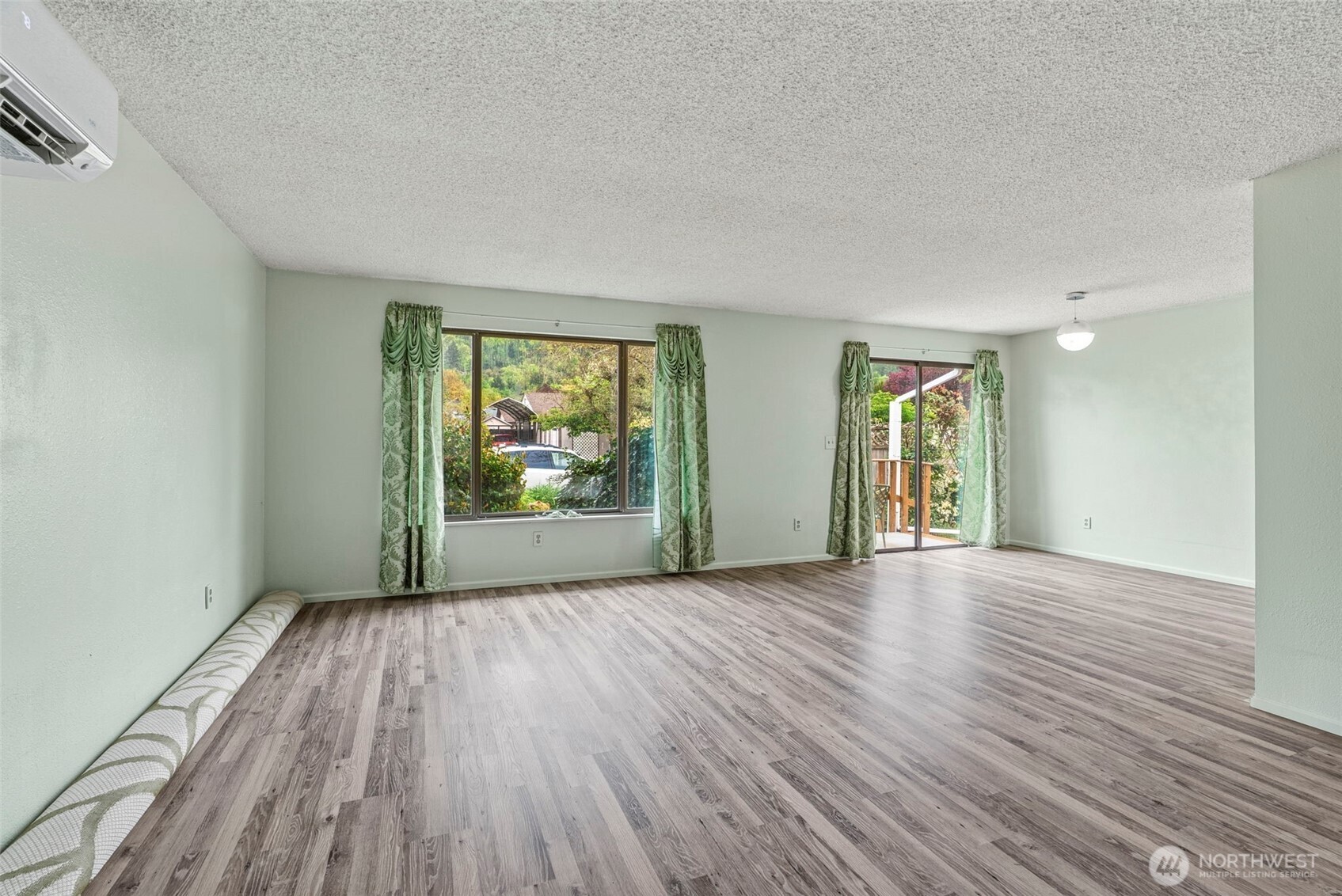 1 Teal Street Longview, WA 98632 - Photo 20 of 36 an empty room with wooden floor and windows