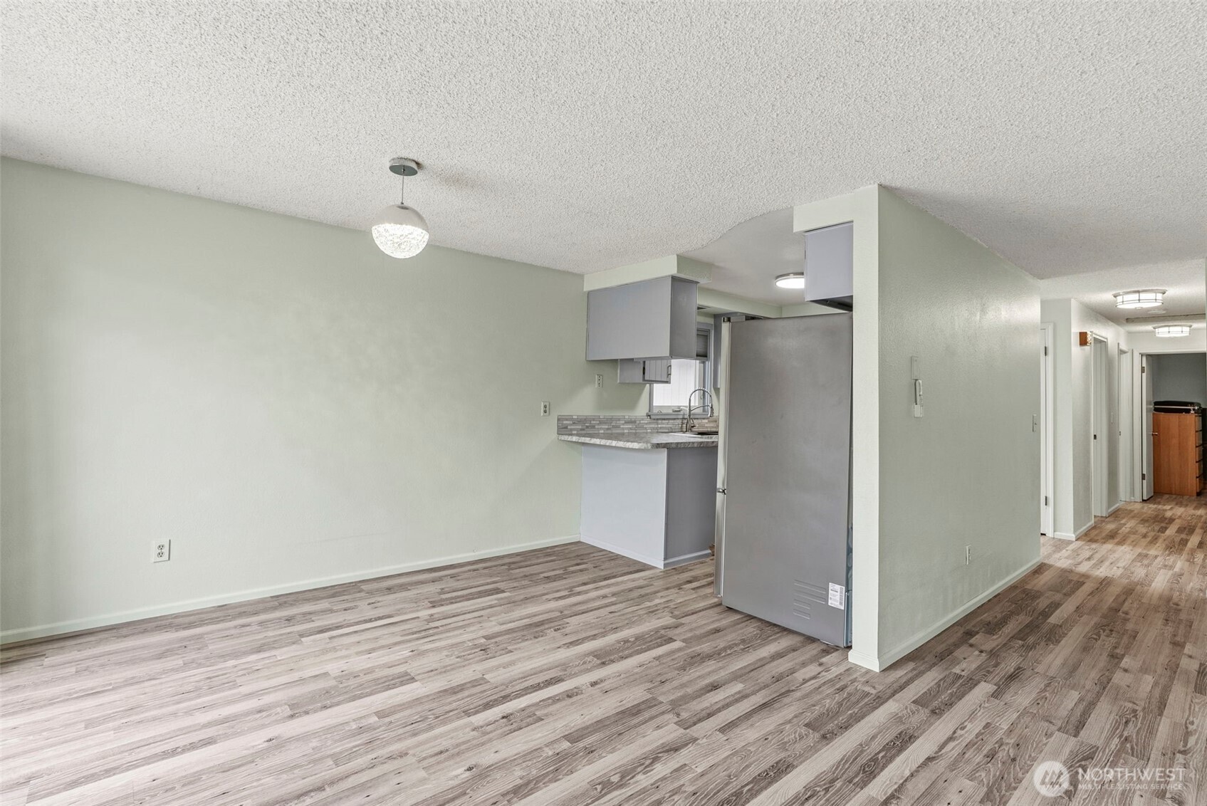 1 Teal Street Longview, WA 98632 - Photo 22 of 36 a view of empty room with wooden floor