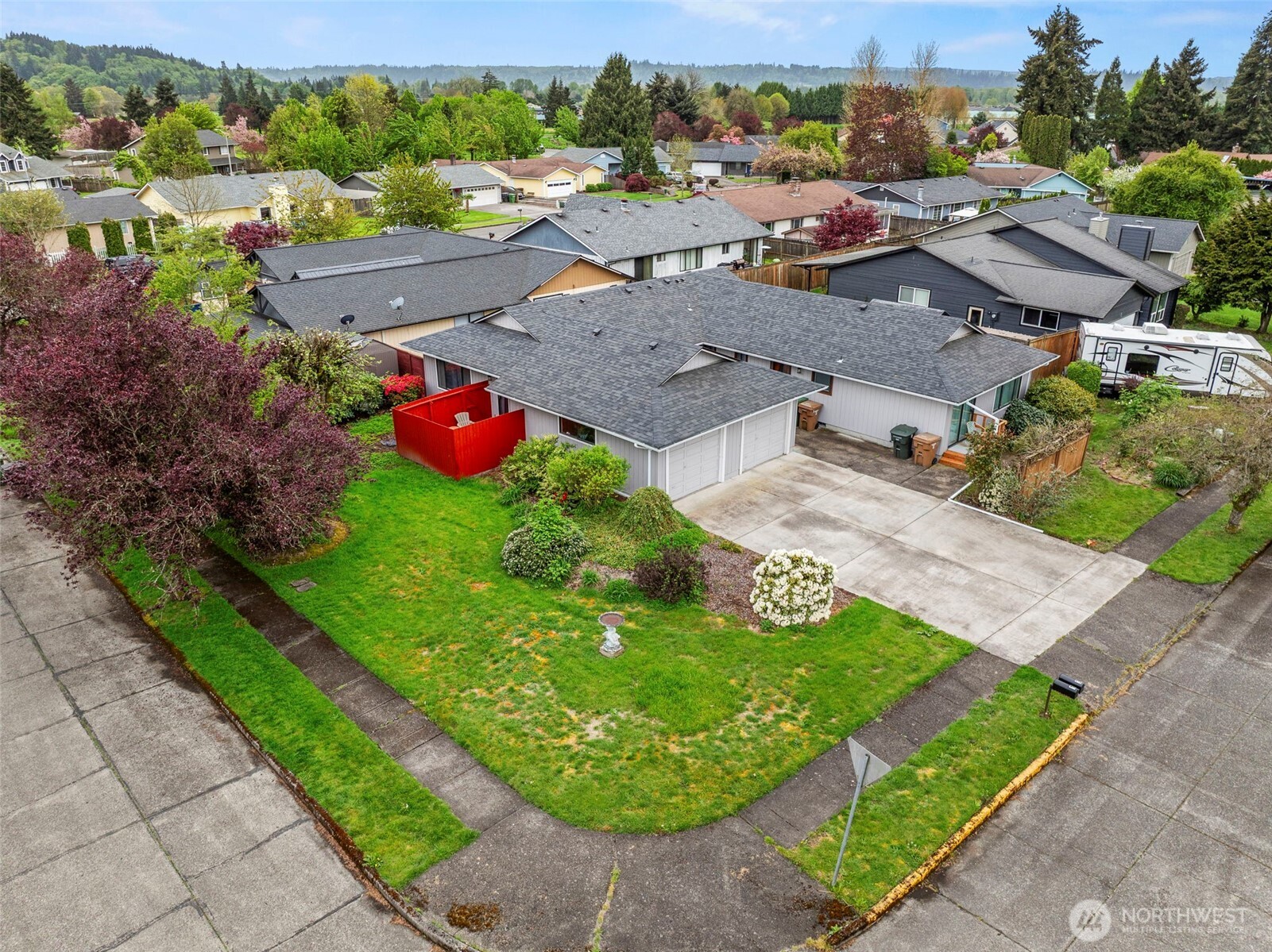 1 Teal Street Longview, WA 98632 - Photo 3 of 36 a view of a street with a large barn