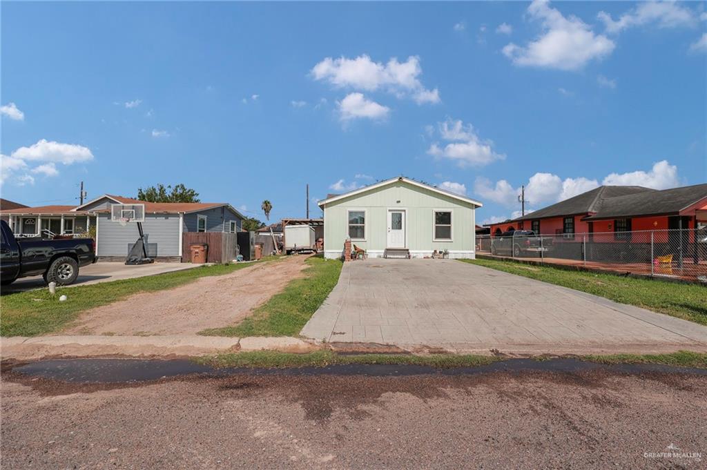 3411 Juan Street Edinburg, TX 78541 - Photo 1 of 1 View of front facade with driveway and a residential view