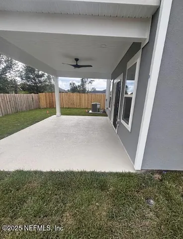 a kitchen view with appliances and cabinets