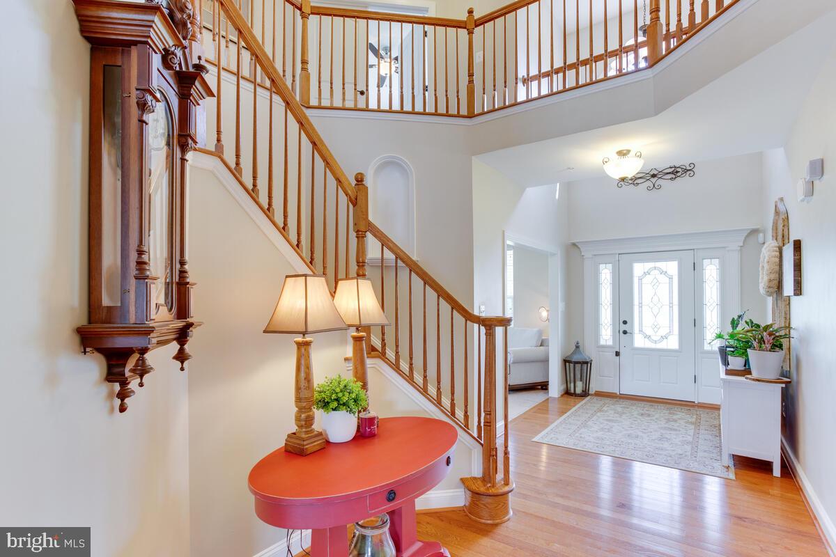 378 East Bay Front Road Deale, MD 20751 - Photo 5 of 43 a view of entryway and hall with wooden floor