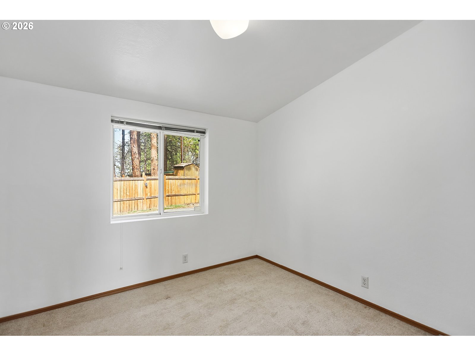 39 North Eagle Point Road Tygh Valley, OR 97063 - Photo 20 of 35 a view of an empty room with a window
