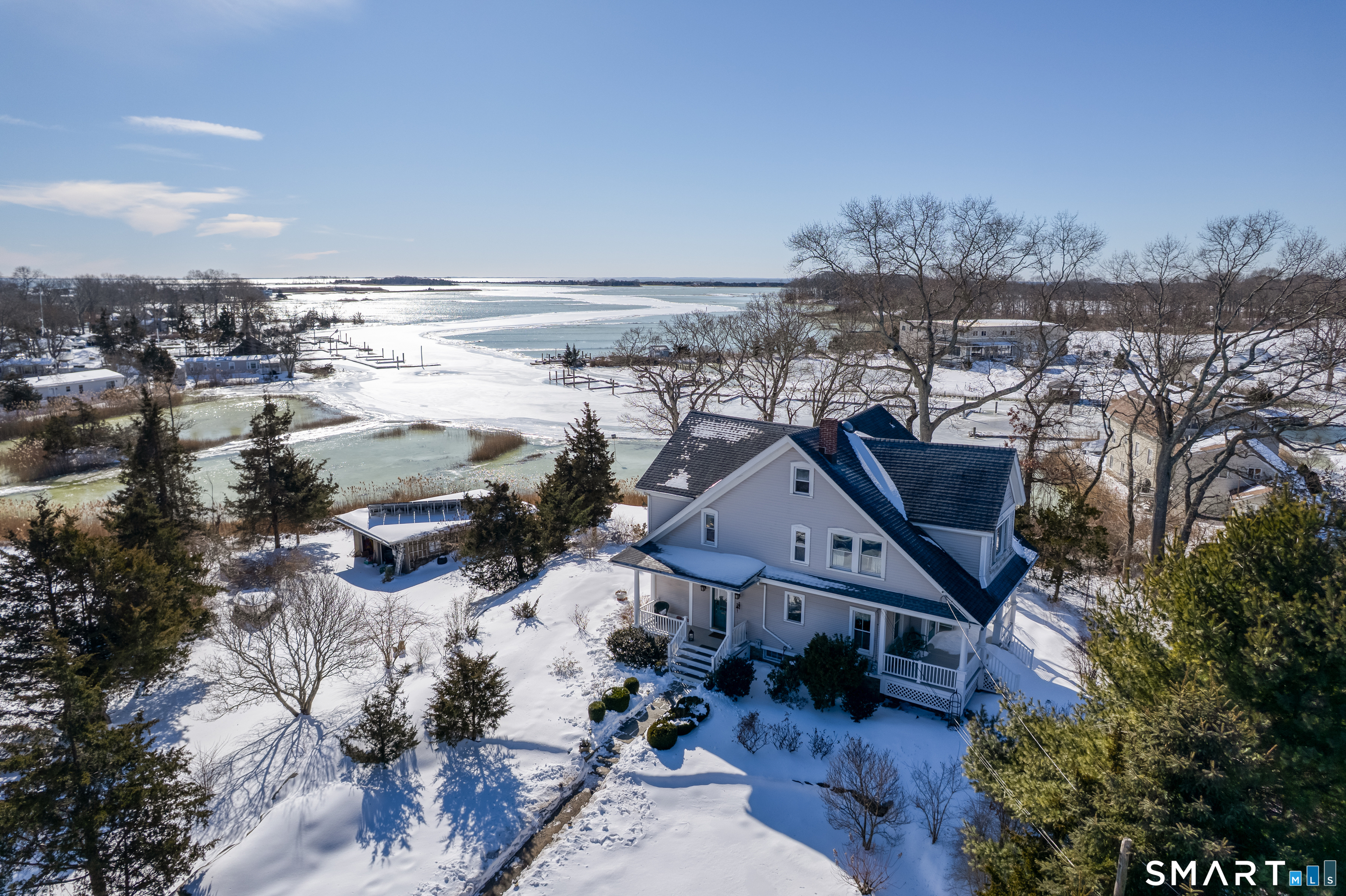 178 West Main Street Clinton, CT 06413 - Photo 1 of 1 a view of houses with outdoor space and seating