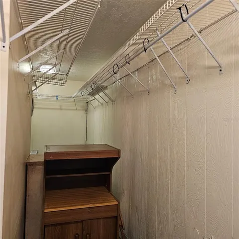 a bathroom with a sink and shower