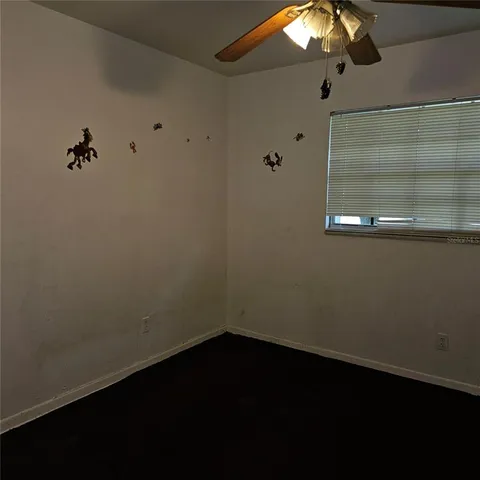 a view of small space with a wooden floor