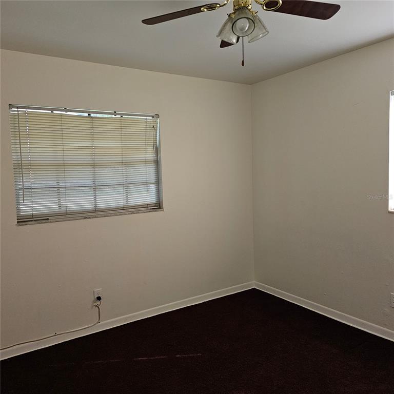 901 8th Street Southwest Ruskin, FL 33570 - Photo 27 of 27 a view of an empty room with a window