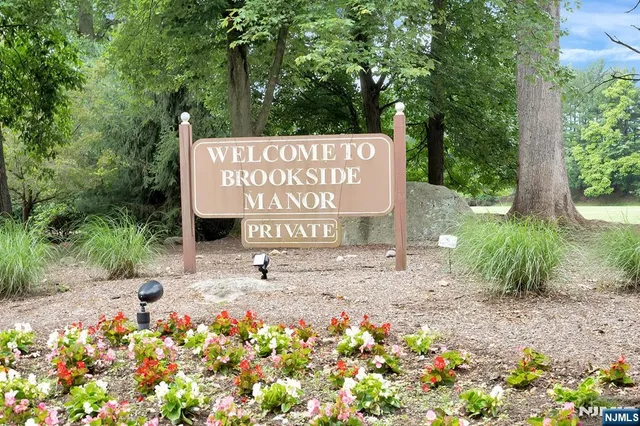 a sign on the side of the road