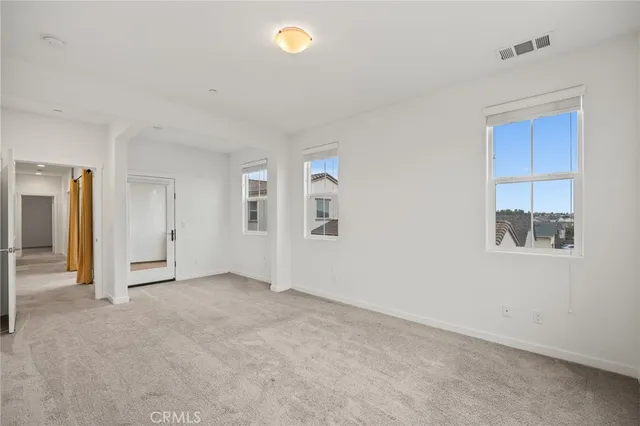 an empty room with windows