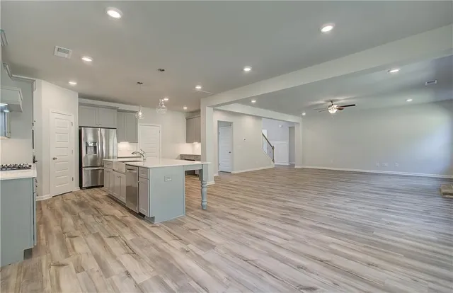 a view of kitchen with wooden floor