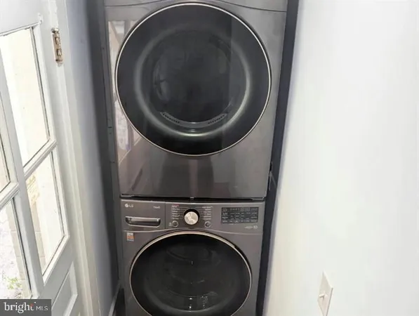 a close up view of a washer and dryer in a utility room