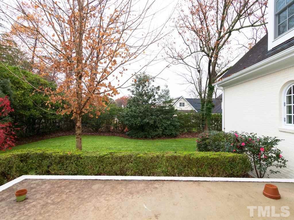 2206 Coley Forest Place Raleigh, NC 27607 - Photo 22 of 25 a view of a park with a trees