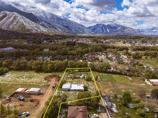 2672 East Canyon Road Springville, UT 84663 - Photo 2 of 33 Aerial perspective of suburban area with property parcel outlined and a mountainous background