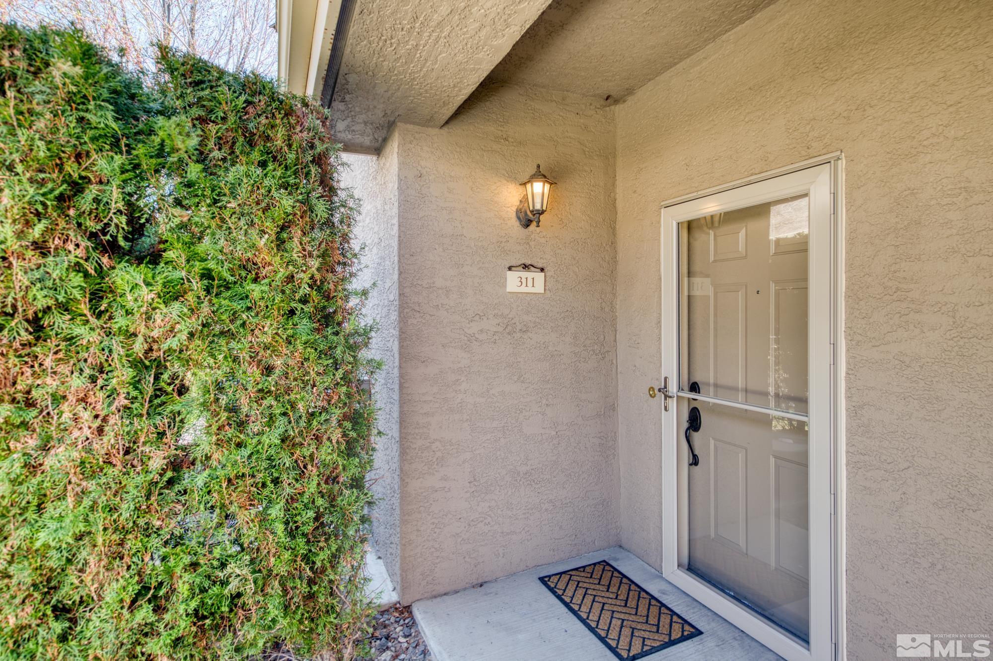 900 South Meadows Parkway, Unit 311 Reno, NV 89521 - Photo 3 of 40 front view of a house with a shower