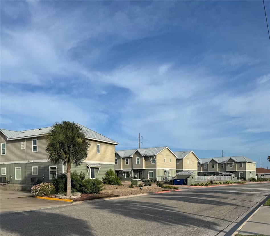 14310 Ridley Way Corpus Christi, TX 78418 - Photo 1 of 19 a view of city with tall buildings