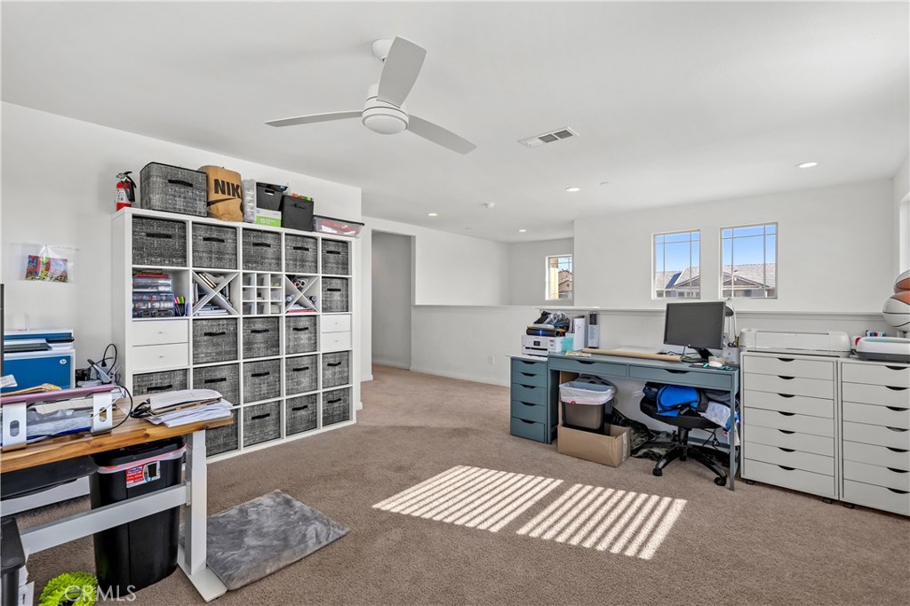 774 Green Court Perris, CA 92571 - Photo 11 of 25 a workspace with furniture