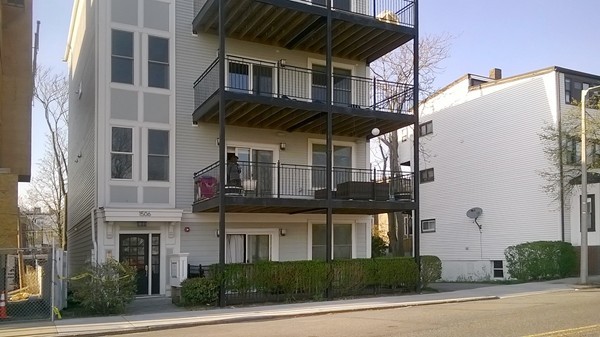 a view of a building with a street