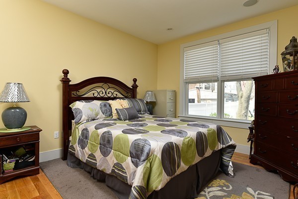 1506 Columbia Road, Unit 1 Boston, MA 02127 - Photo 16 of 24 a bedroom with a bed and a window