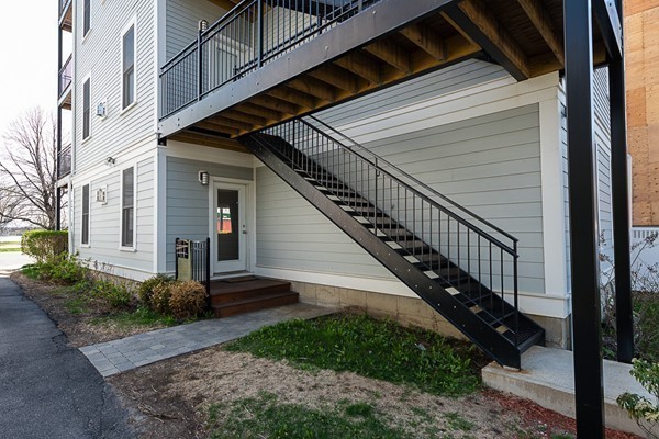 1506 Columbia Road, Unit 1 Boston, MA 02127 - Photo 20 of 24 a view of a house with a yard