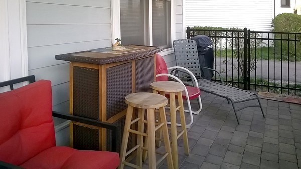 1506 Columbia Road, Unit 1 Boston, MA 02127 - Photo 3 of 24 a balcony with table and chairs