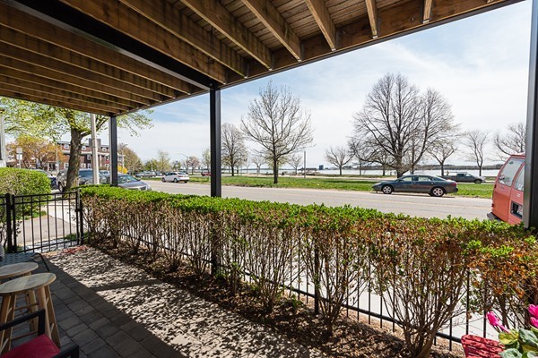 1506 Columbia Road, Unit 1 Boston, MA 02127 - Photo 6 of 24 a view of a yard with wooden fence