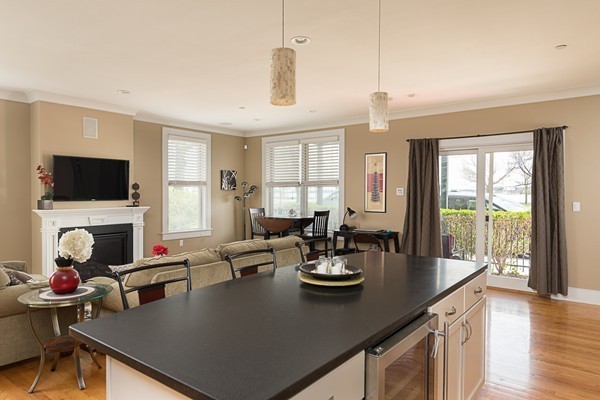 1506 Columbia Road, Unit 1 Boston, MA 02127 - Photo 8 of 24 a living room with furniture fireplace and flat screen tv