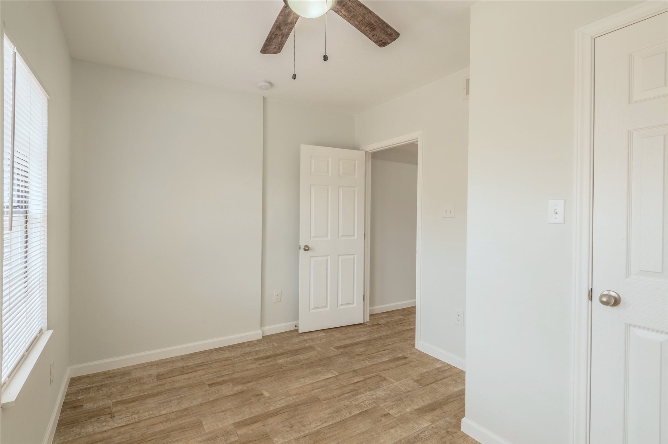 2319 Rosewood Street, Unit A Houston, TX 77004 - Photo 12 of 15 a view of an empty room with a window