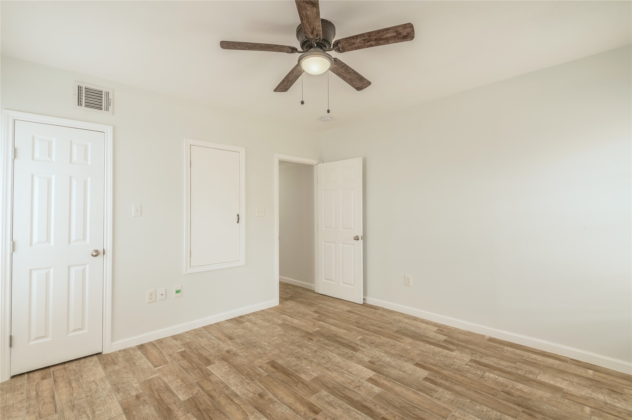 2319 Rosewood Street, Unit A Houston, TX 77004 - Photo 14 of 15 wooden floor in an empty room