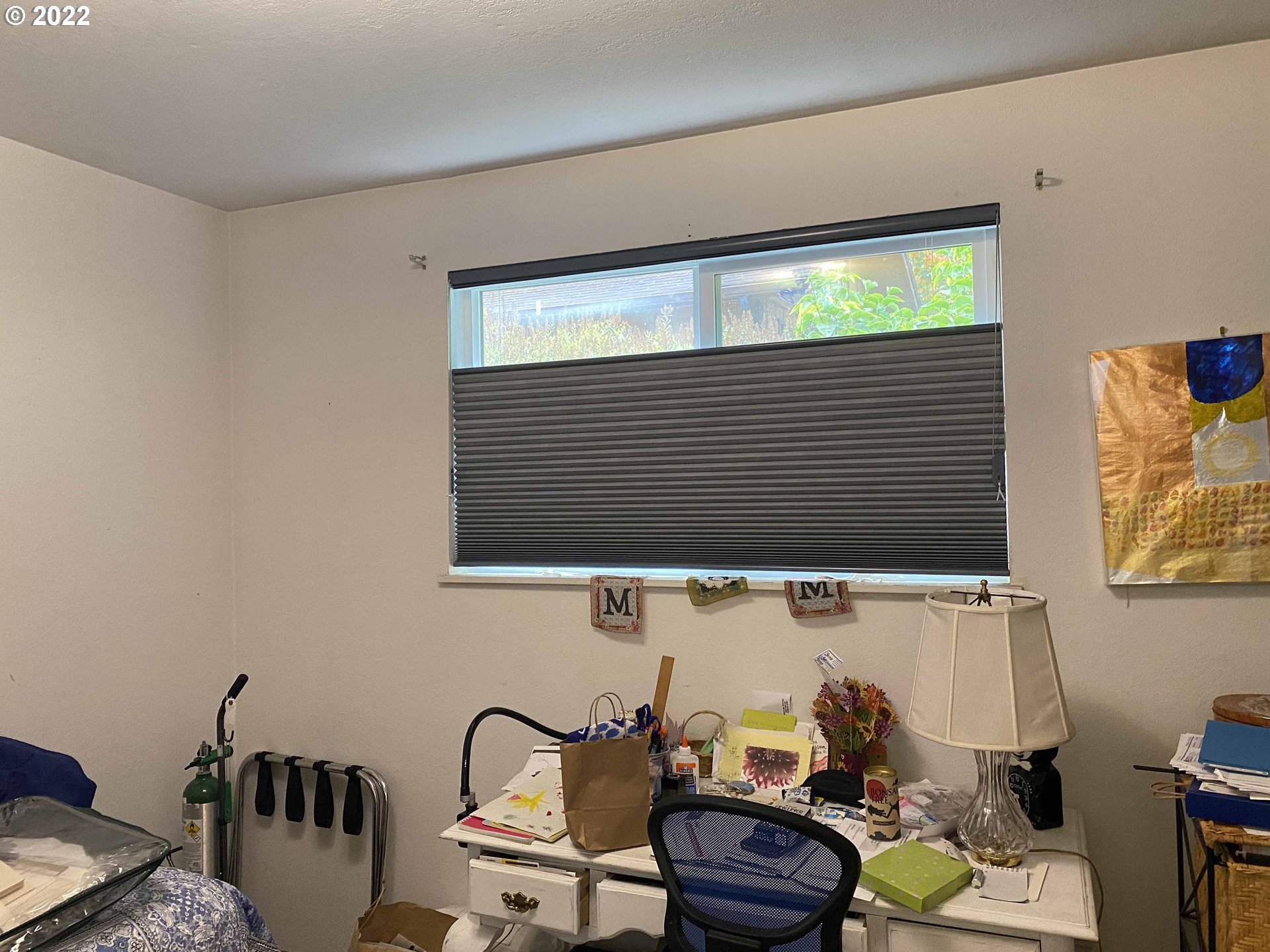 2222 11th Street Florence, OR 97439 - Photo 15 of 32 a bathroom with a sink and a window