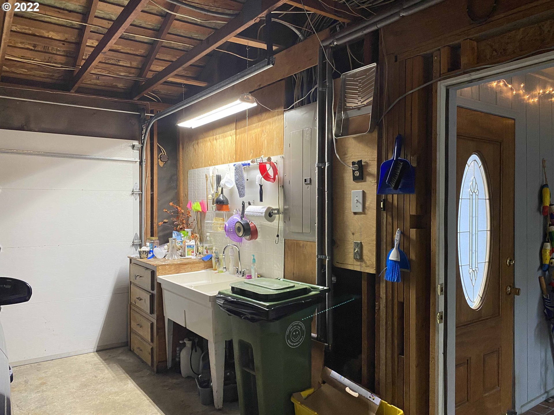 2222 11th Street Florence, OR 97439 - Photo 30 of 32 a room with storage and utility