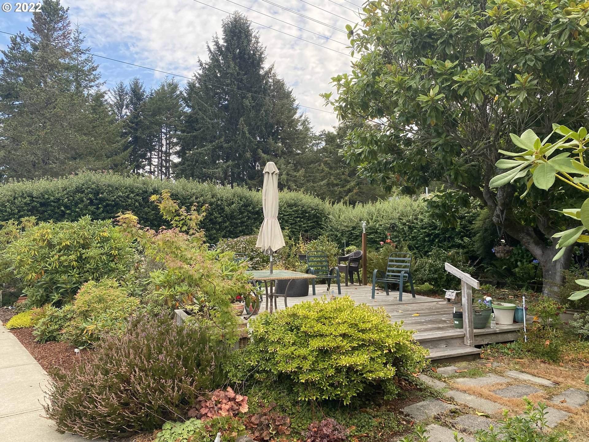 2222 11th Street Florence, OR 97439 - Photo 3 of 32 a view of statue in a garden