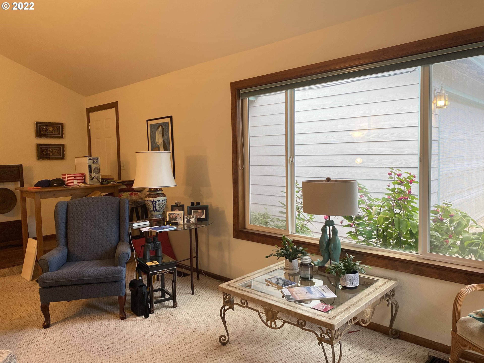 2222 11th Street Florence, OR 97439 - Photo 9 of 32 a living room with furniture and floor to ceiling windows