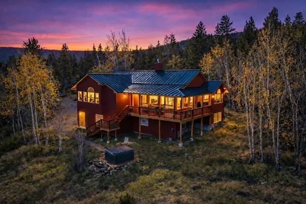 a view of a chairs and table in the patio
