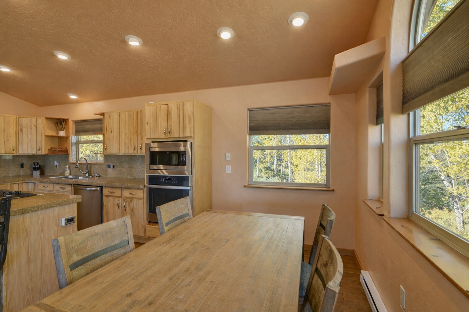 155 Lamb Mountain Road Fairplay, CO 80440 - Photo 13 of 48 a kitchen with stainless steel appliances granite countertop a refrigerator and a stove top oven