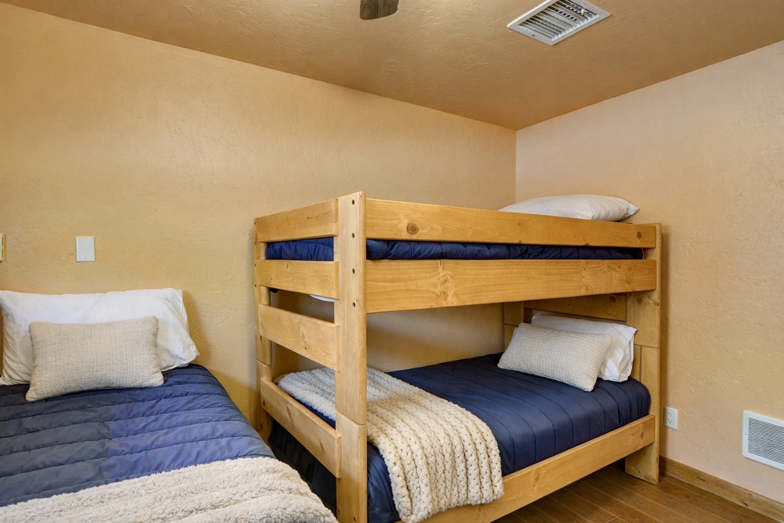 155 Lamb Mountain Road Fairplay, CO 80440 - Photo 20 of 48 a bedroom with a bed and a night stand