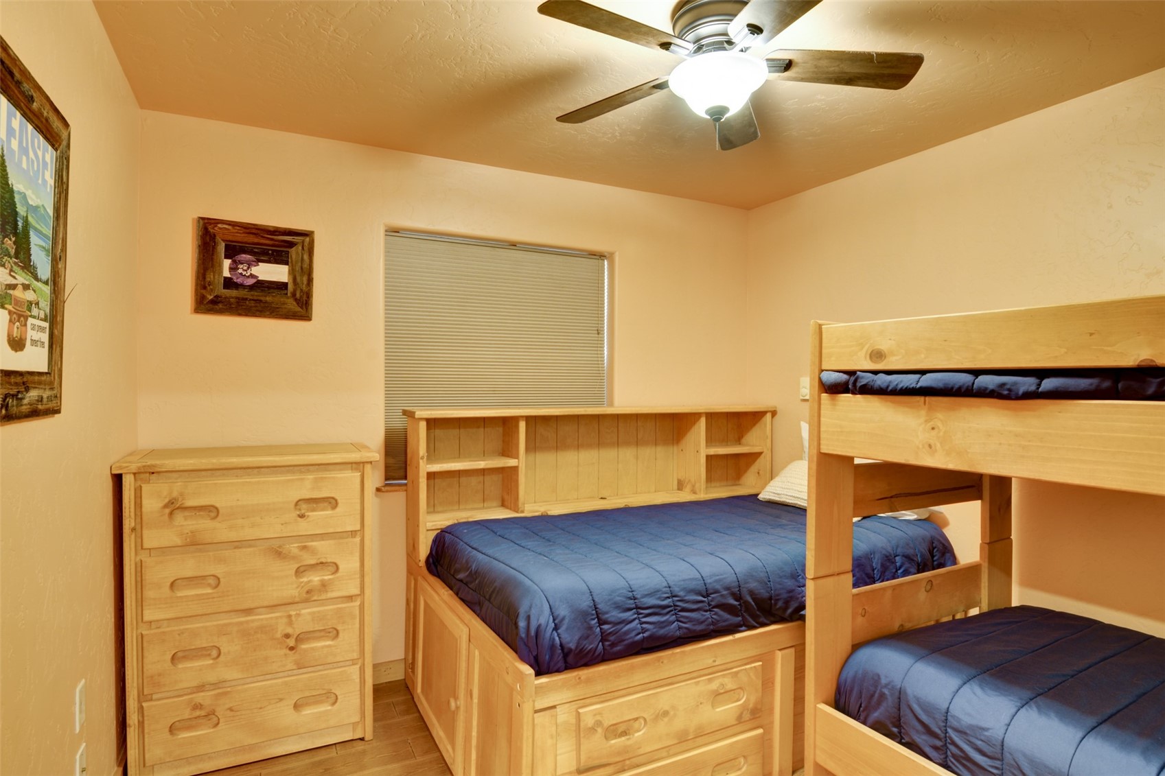 155 Lamb Mountain Road Fairplay, CO 80440 - Photo 21 of 48 a bedroom with a bed and cabinets