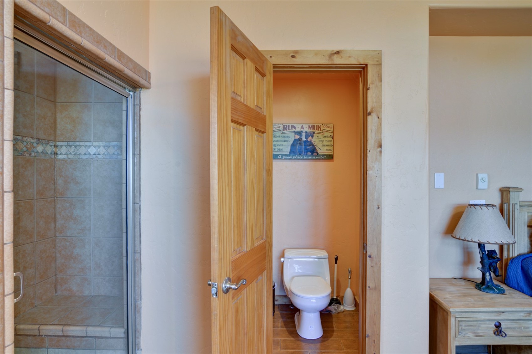 155 Lamb Mountain Road Fairplay, CO 80440 - Photo 28 of 48 a bathroom with a toilet and a mirror