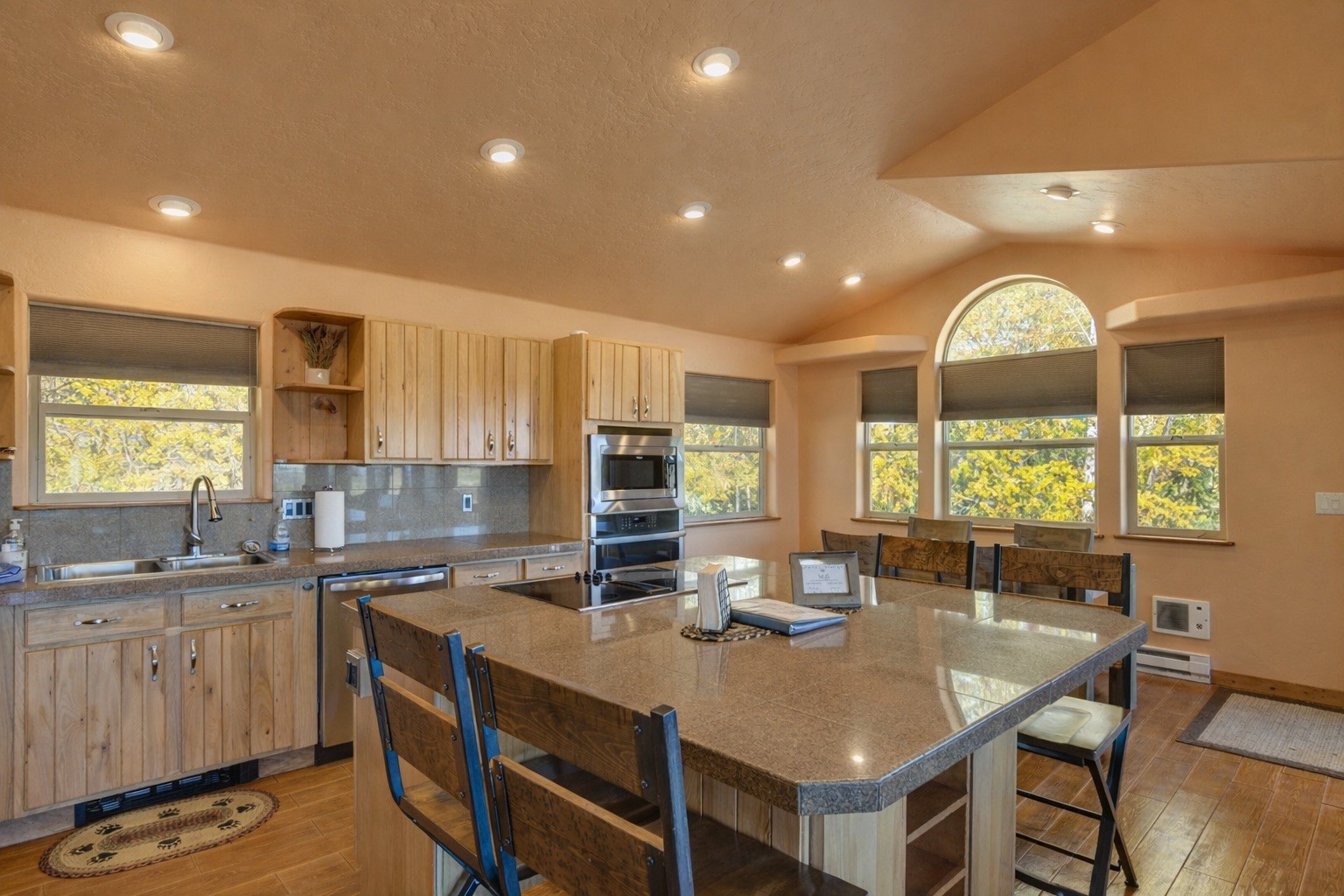 155 Lamb Mountain Road Fairplay, CO 80440 - Photo 10 of 48 a kitchen with stainless steel appliances granite countertop a sink a stove and a refrigerator
