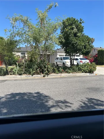 front view of a house with a street