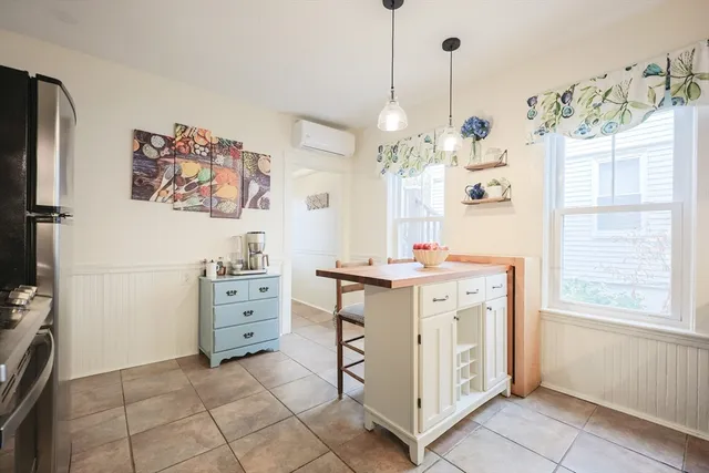 a kitchen with a refrigerator and countertop