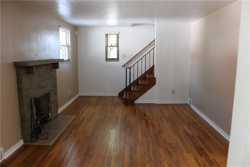 1216 Pine Hollow Road McKees Rocks, PA 15136 - Photo 4 of 25 Living Room without Furnishings and Paint has been touched up.