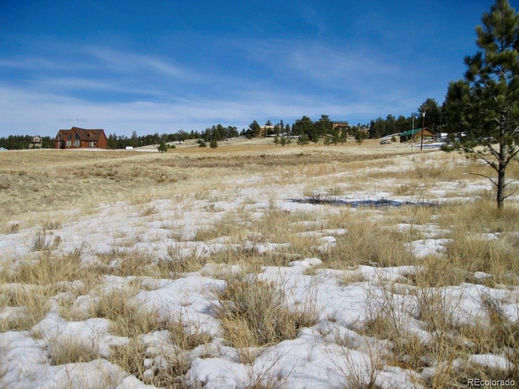 486 High Pasture Road Florissant, CO 80816 - Photo 9 of 15 a view of ocean with sunset