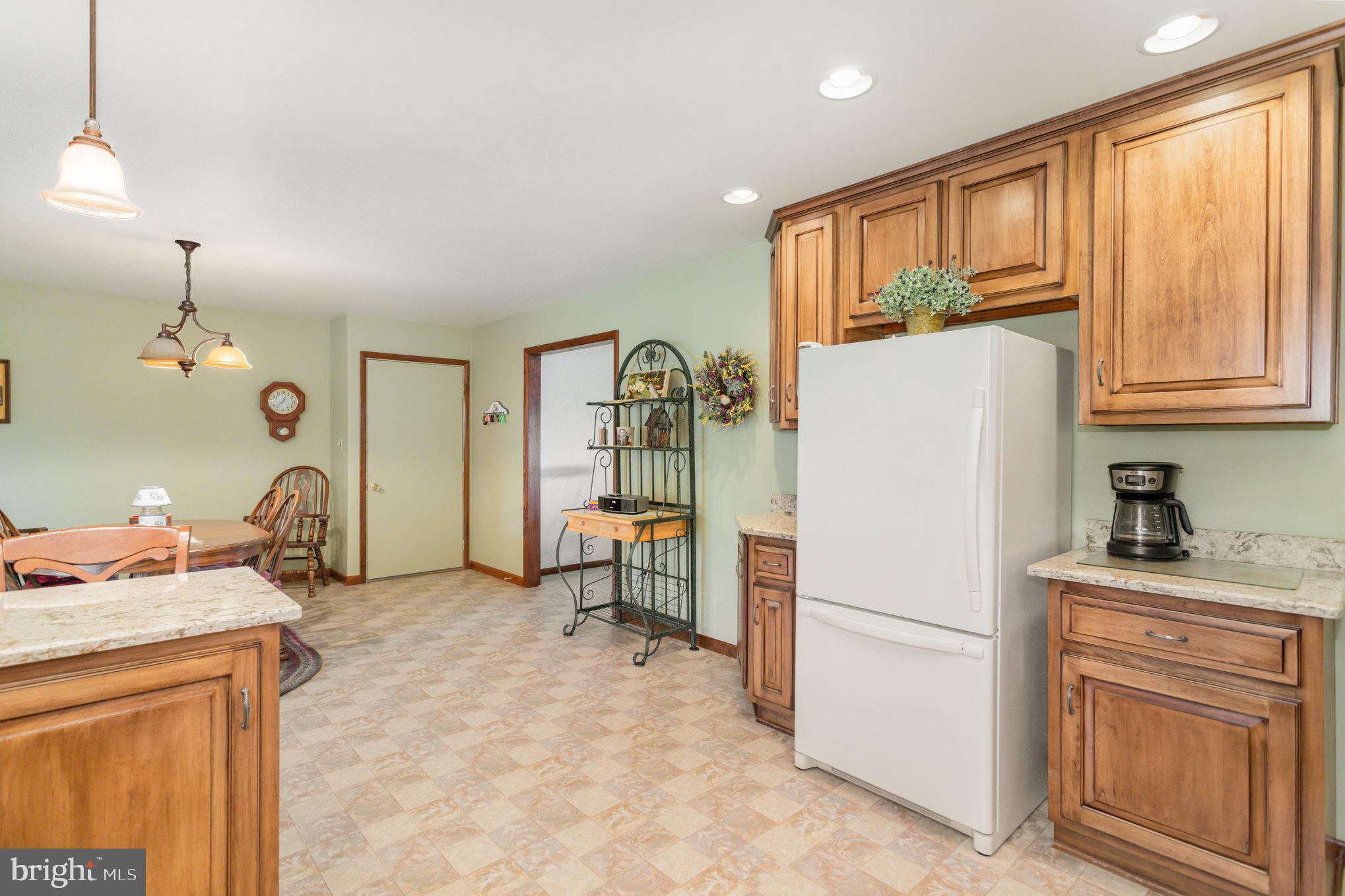 29 Robin Circle Halifax, PA 17032 - Photo 13 of 35 a kitchen with a refrigerator and a stove top oven