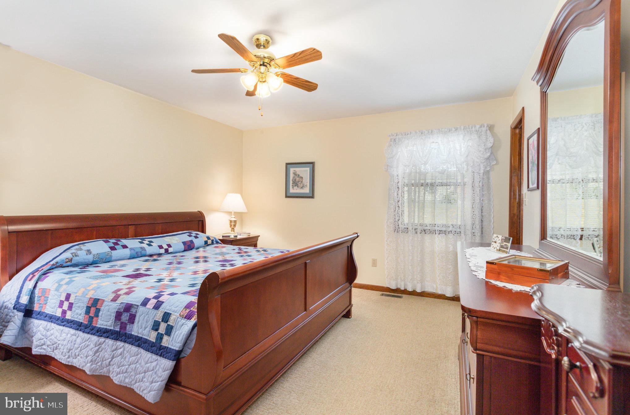 29 Robin Circle Halifax, PA 17032 - Photo 17 of 35 a bedroom with a bed and a window
