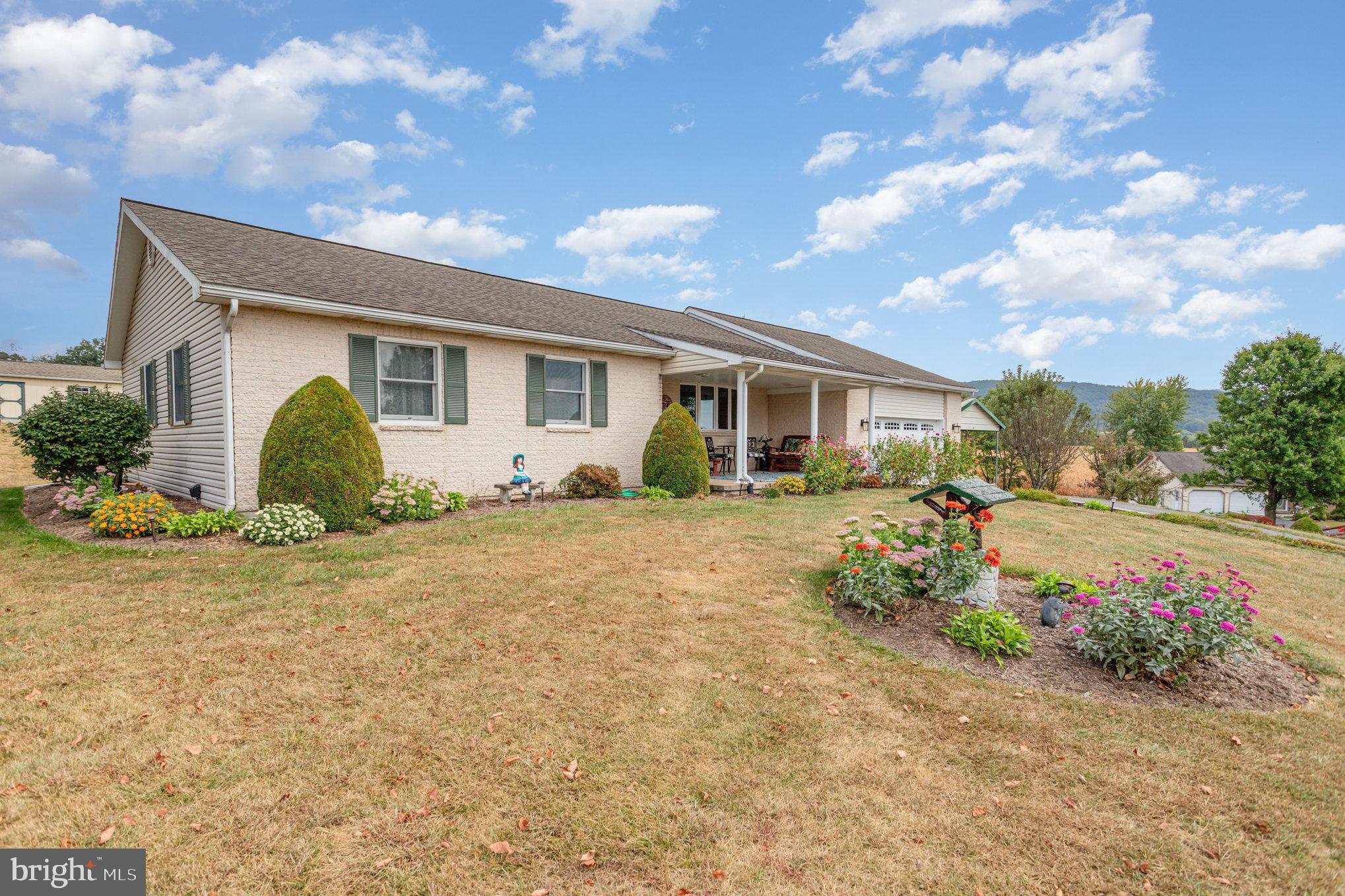 29 Robin Circle Halifax, PA 17032 - Photo 2 of 35 a front view of a house with garden