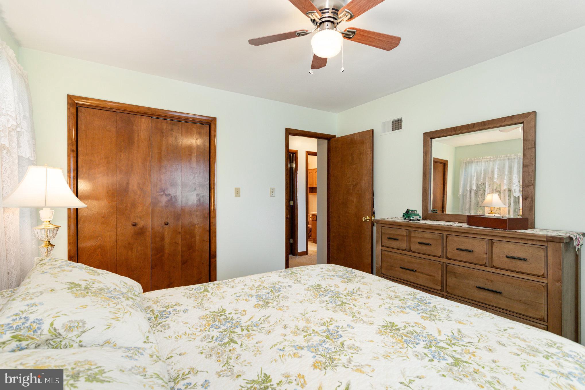 29 Robin Circle Halifax, PA 17032 - Photo 21 of 35 a bed room with a bed and a large mirror