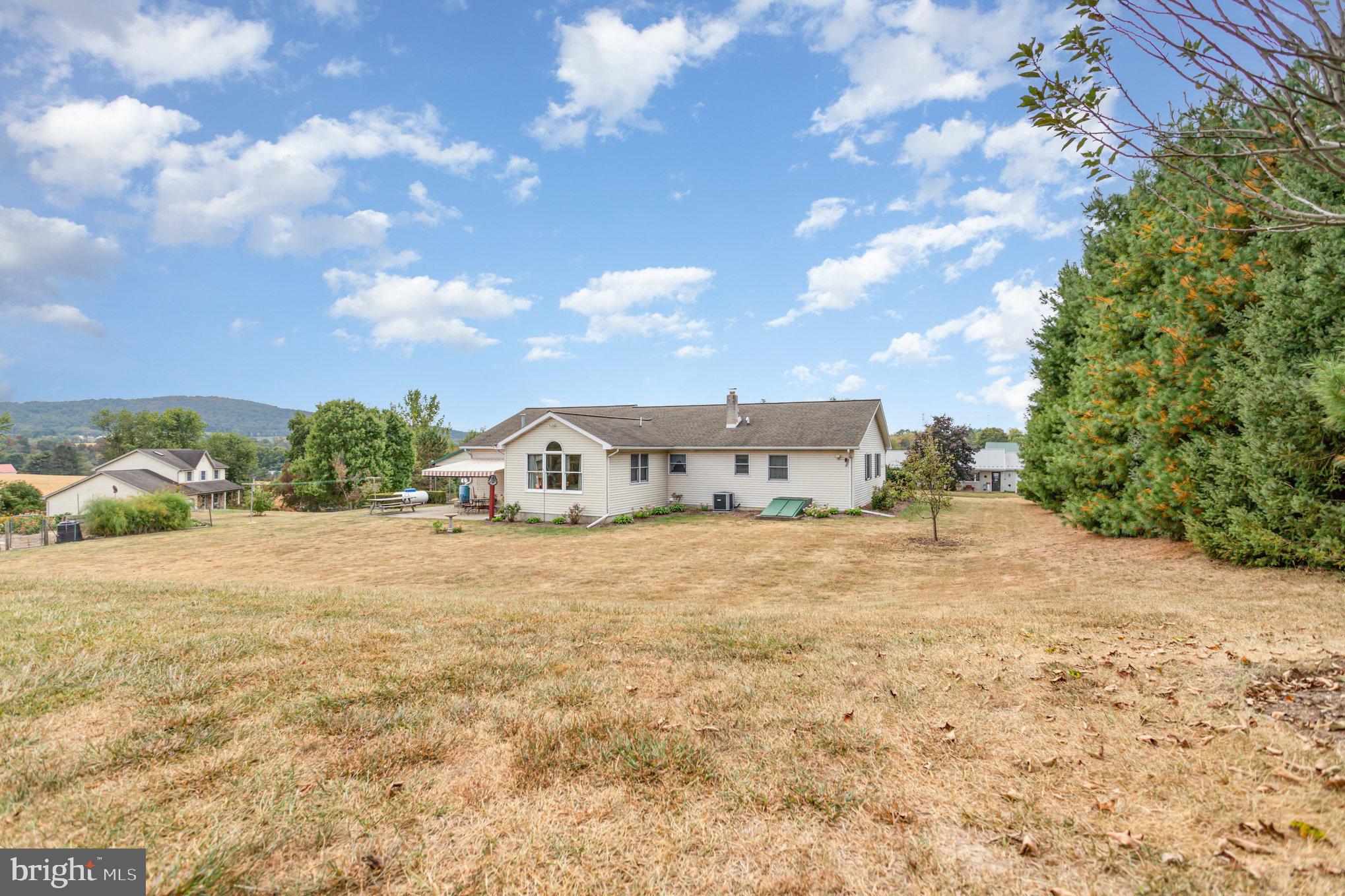 29 Robin Circle Halifax, PA 17032 - Photo 28 of 35 a big house with a big yard with large trees